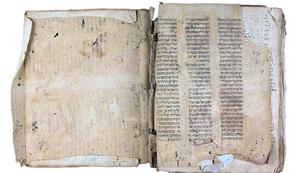 'Llibre de definicions de cauces pies nº 9' que tiene un pergamino con un fragmento del Génesis.