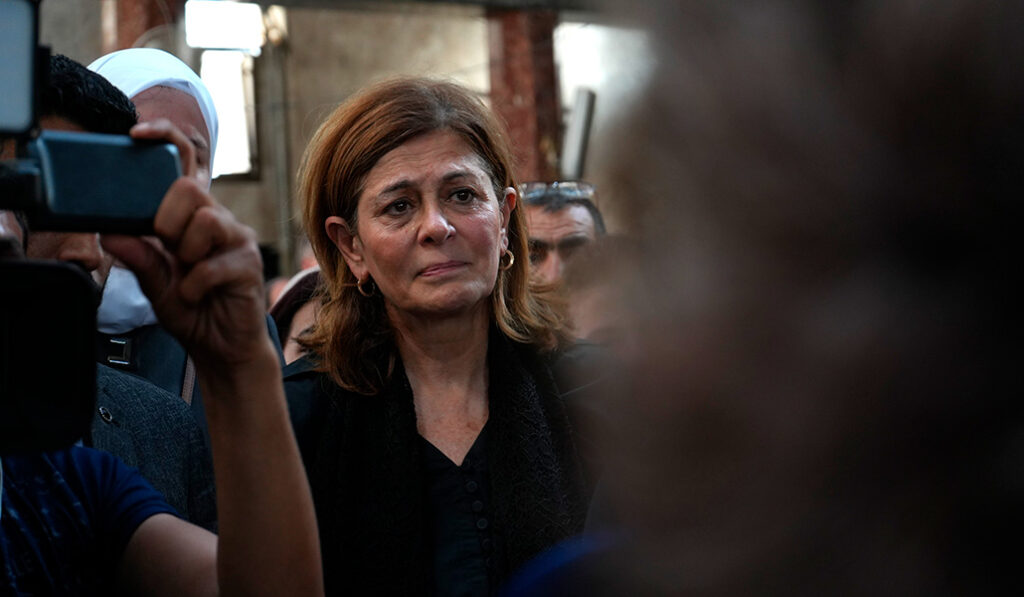 Hind Aboud Kabawat, ministra de Asuntos Sociales y cristiana, en uno de los funerales