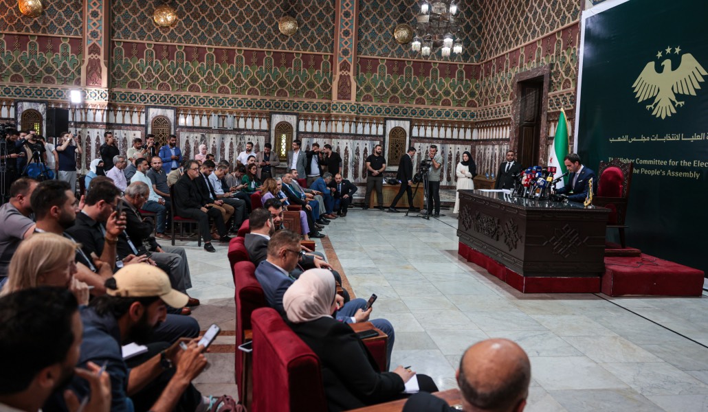 El portavoz del Alto Comité para las Elecciones a la Asamblea Popular presenta los resultados el lunes 6 de octubre.