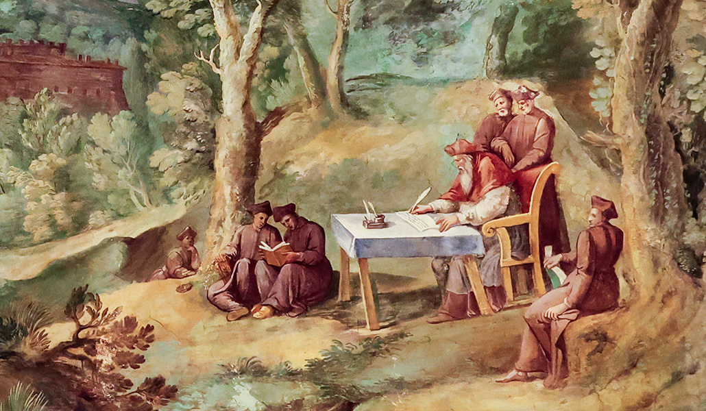 Este detalle de un fresco de los Museos Vaticanos le representa escribiendo una regla para los camalduenses.