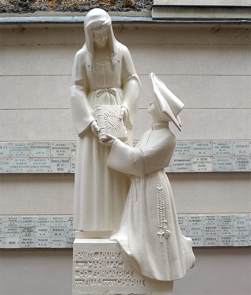 Marillac entrega la regla a santa Catalina Labouré. Casa Madre de las Hijas de la Caridad en París.
